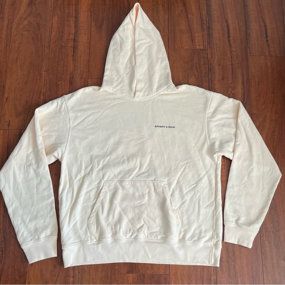 Sporty & Rich Cream Hoodie with Yellow Sun Design - Picture 2 of 6